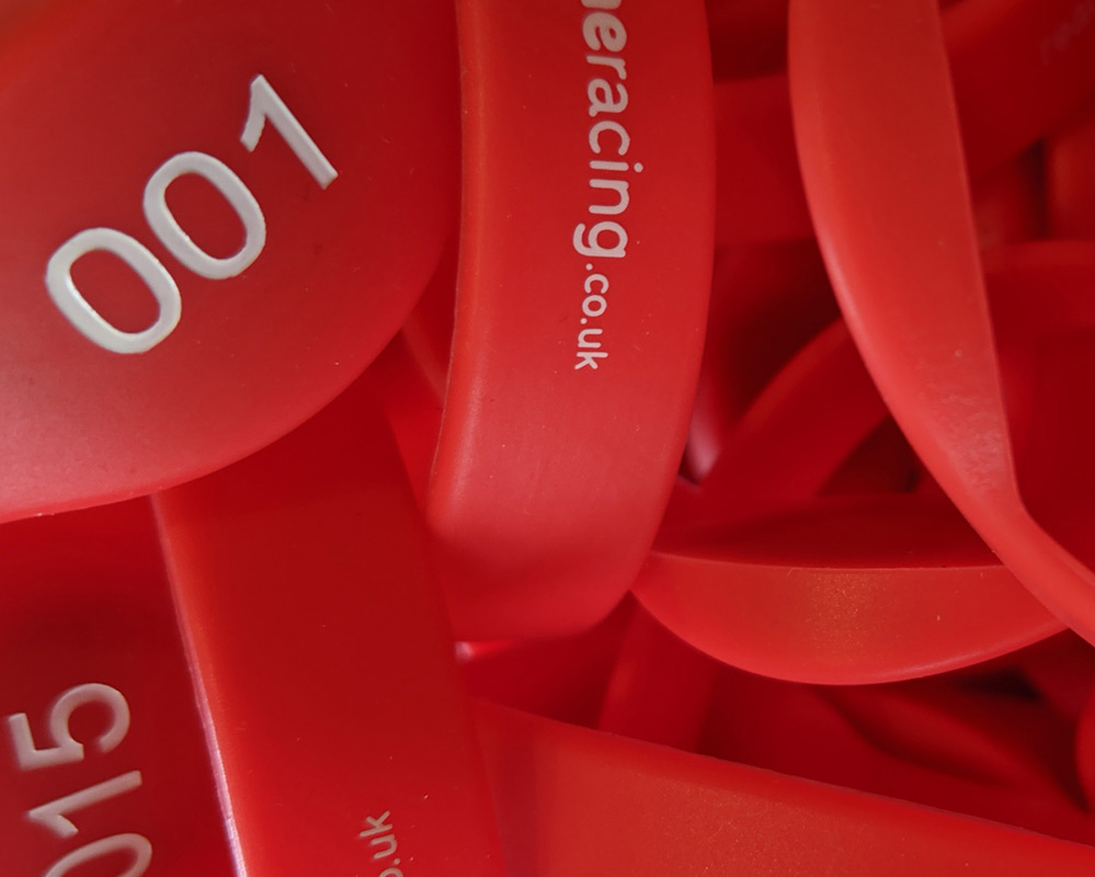 Red numbered Realtime Racing RFID timing wristbands